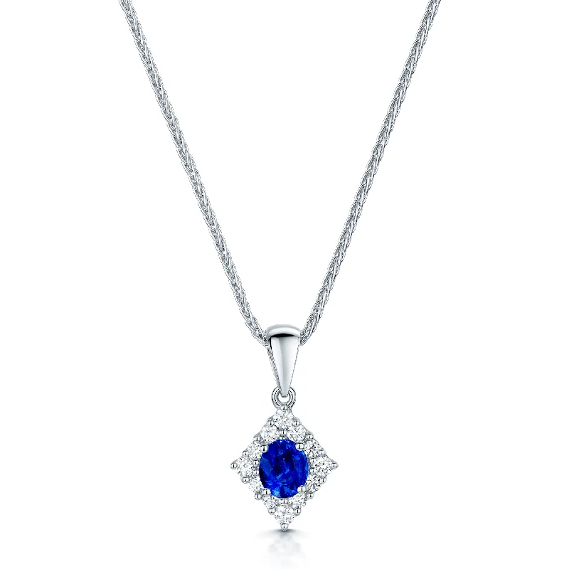 Chunky Gemstone Necklace for Bold Look-18ct White Gold Oval Cut Sapphire And Diamond Halo Pendant