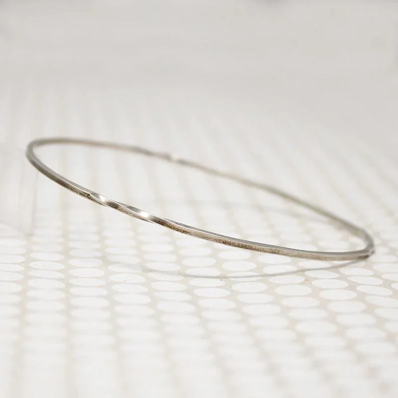 Designer Silver Bangles with Gemstone Inlays-The Endless Twist Oval Bangle in Sterling from Allie B.