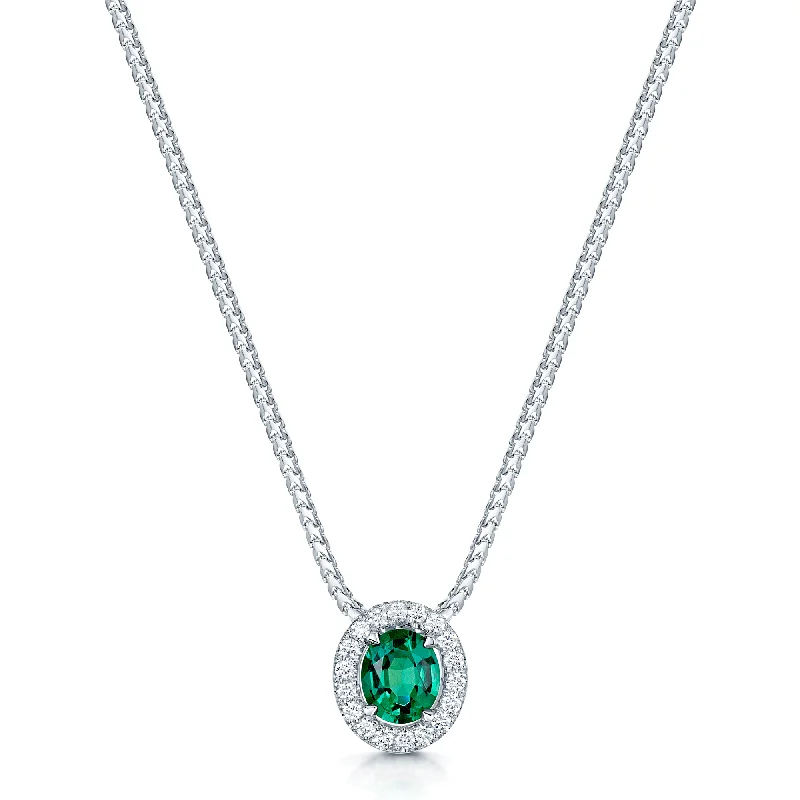 Designer Gemstone Necklace for Bridesmaids-18ct White Gold Oval Cut Emerald And Diamond Halo Pendant