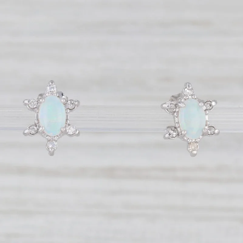 Crystal Earrings for Special Events-Oval Opal Diamond Halo Stud Earrings 14k White Gold