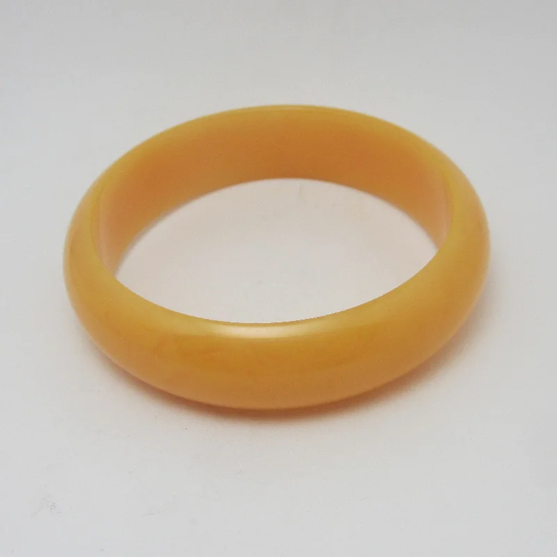 Elegant Bangle Set with Precious Gemstones for Brides-Amber Plastic Bangle Bracelet Vintage c1960